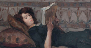 Reading woman on a couch by Isaac Israels