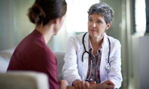 woman getting diagnosis