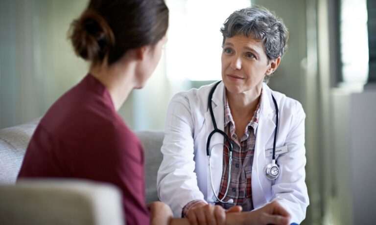 woman getting diagnosis
